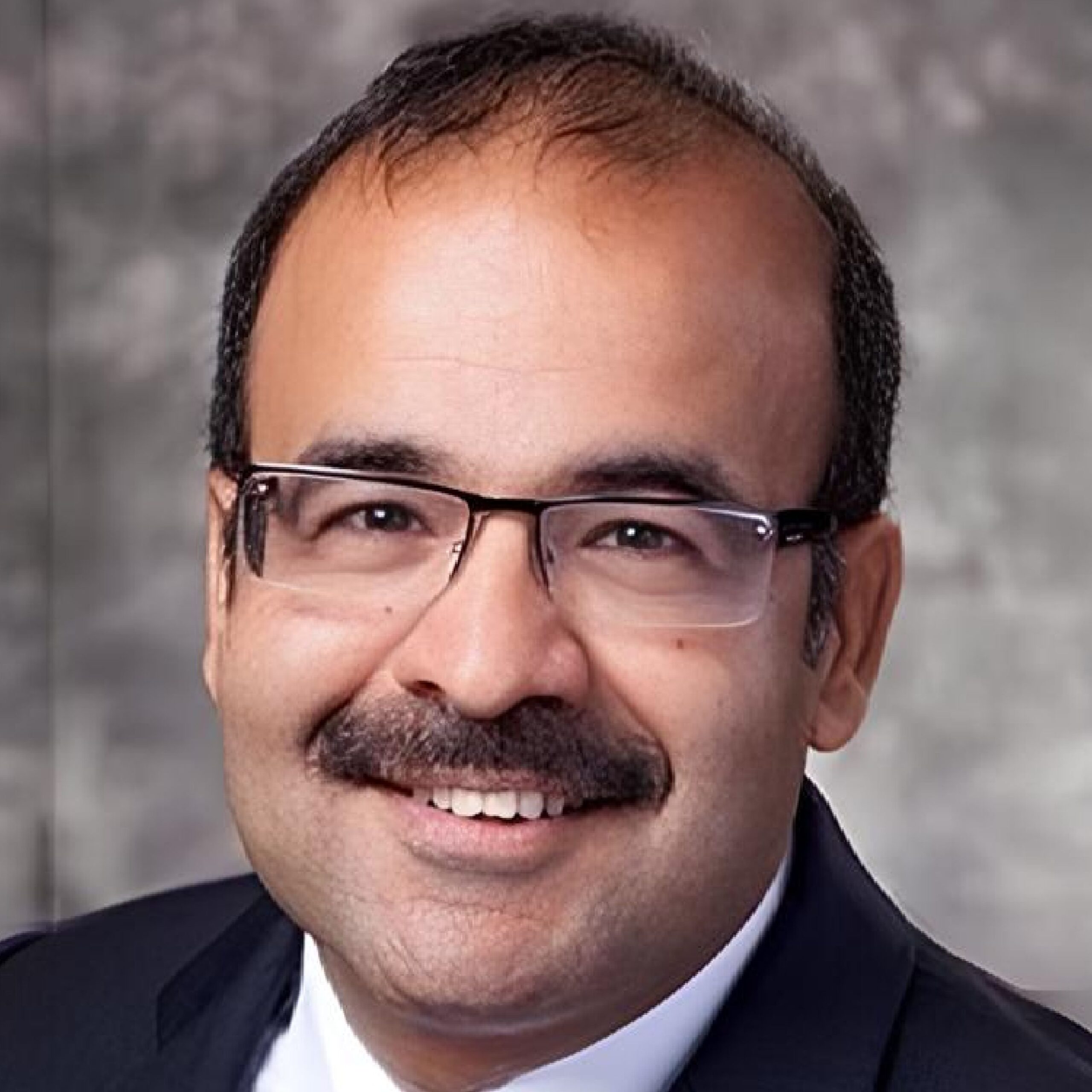 Ajay Malik, CEO of StudioX, expert in wireless networking and AI